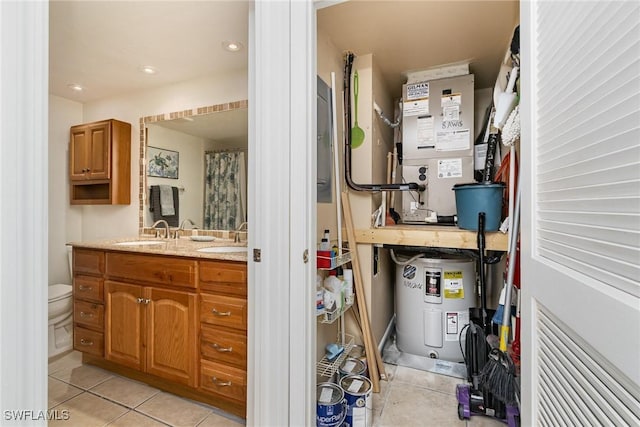 utilities featuring electric water heater and sink