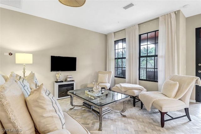 living room with light parquet floors