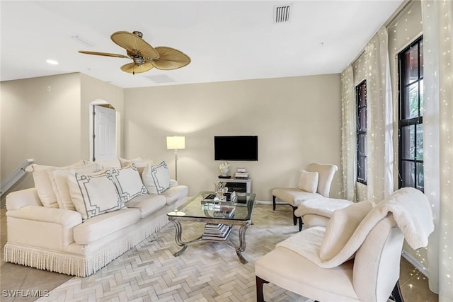 living room featuring ceiling fan