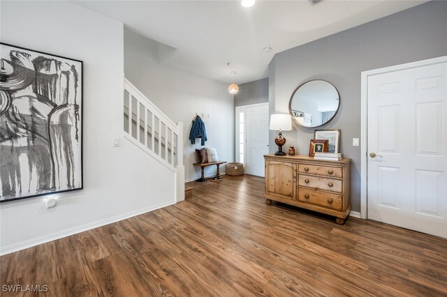 entrance foyer featuring dark hardwood / wood-style flooring