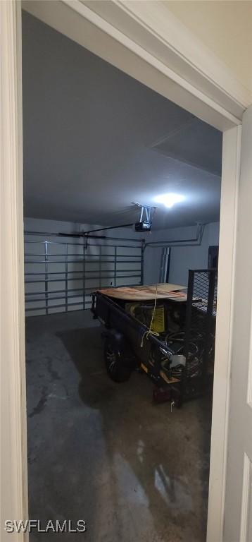 garage featuring a garage door opener