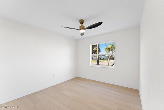 empty room with light hardwood / wood-style floors and ceiling fan