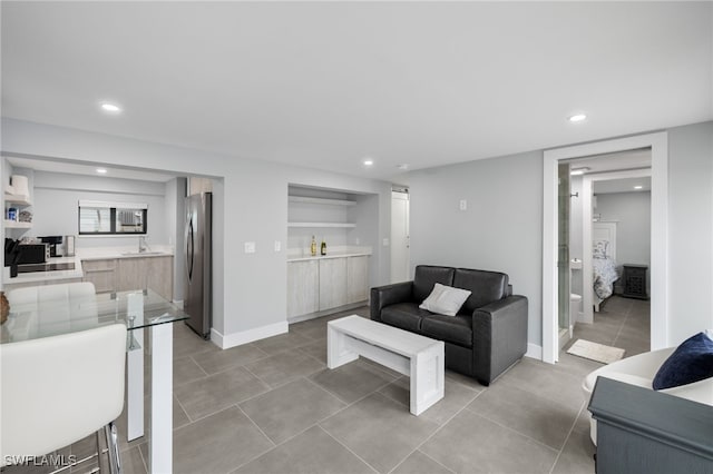 tiled living room with sink