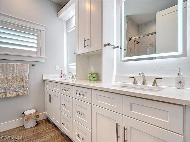 bathroom with vanity and walk in shower