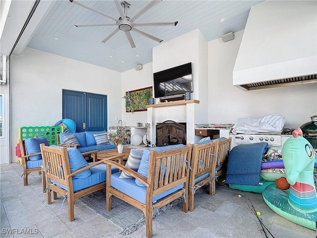 view of patio with an outdoor living space and ceiling fan