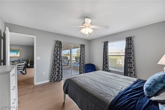 bedroom with ceiling fan, light hardwood / wood-style floors, access to outside, and multiple windows