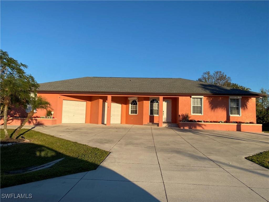 ranch-style home with a garage