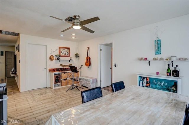 dining area with ceiling fan