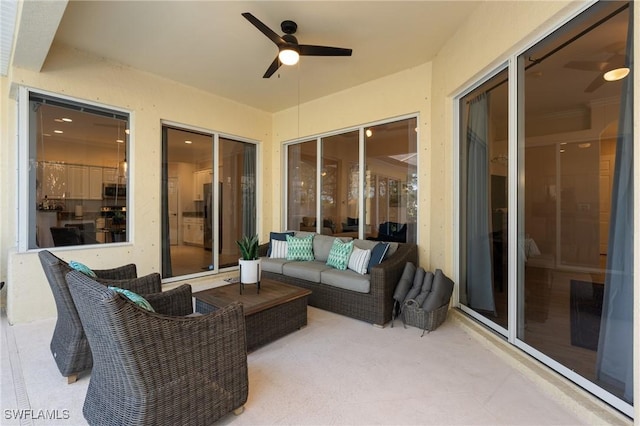 view of patio featuring ceiling fan and outdoor lounge area