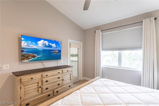 bedroom featuring carpet floors, baseboards, a ceiling fan, and vaulted ceiling