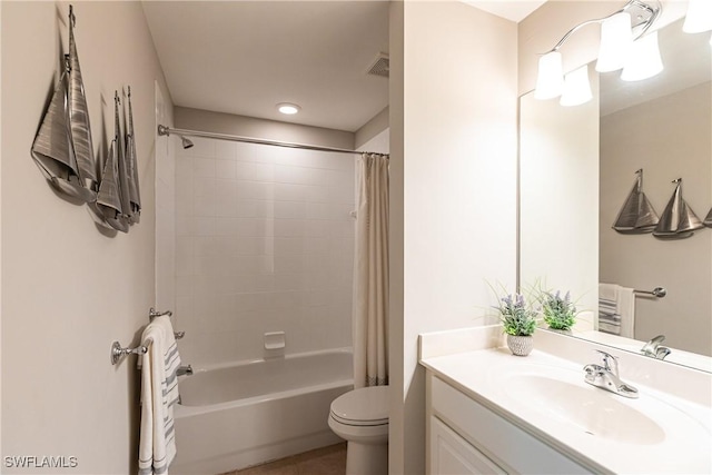 full bath featuring visible vents, shower / tub combo, toilet, and vanity