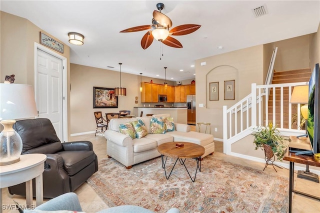 living room with ceiling fan