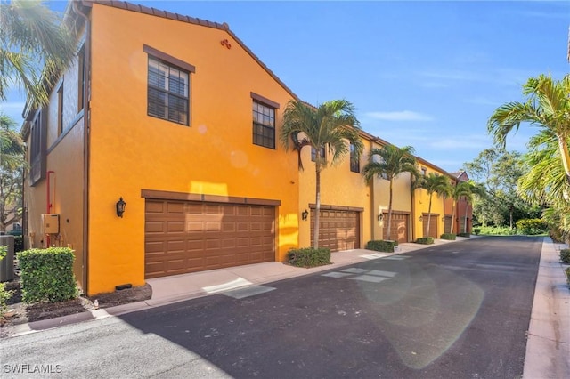 view of property featuring a garage