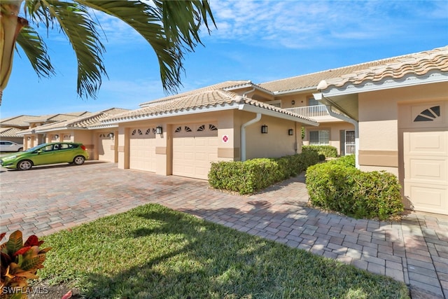 view of side of home featuring a garage