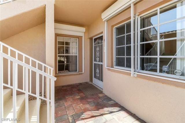 property entrance with a patio area