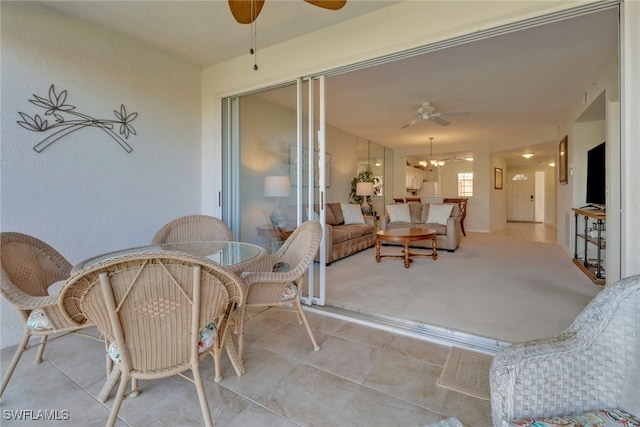 view of patio / terrace featuring ceiling fan