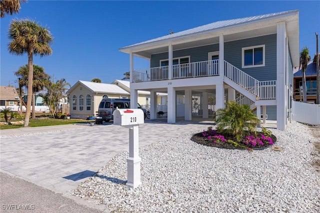 view of front of home featuring a carport