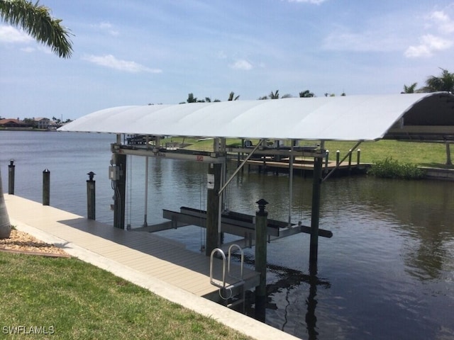 dock area featuring a water view