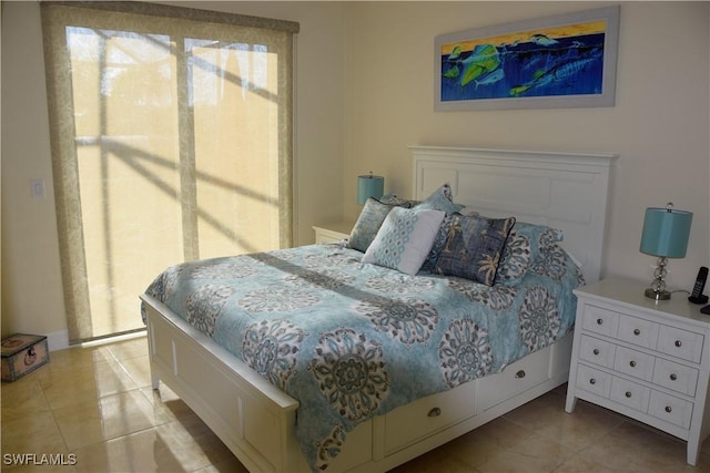 bedroom featuring light tile patterned floors