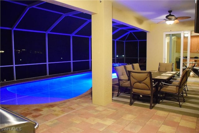 view of pool featuring ceiling fan