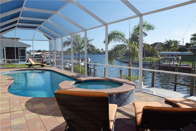 view of pool with a lanai, a water view, an in ground hot tub, a dock, and a patio