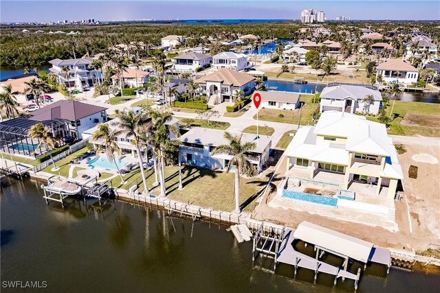 4861 Regal, Bonita Springs, FL 34134 - drone / aerial view featuring a water view