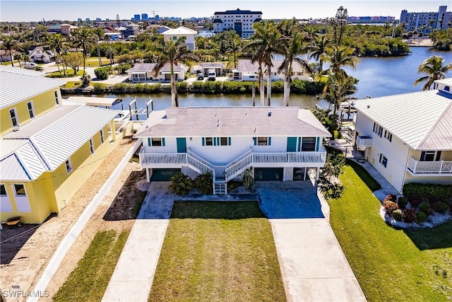 4861 Regal, Bonita Springs, FL 34134 - birds eye view of property featuring a water view