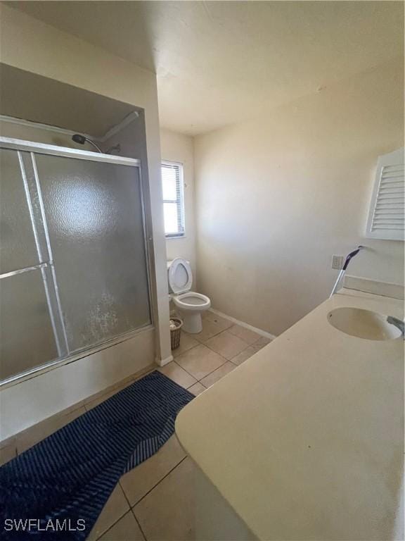 4861 Regal, Bonita Springs, FL 34134 - bathroom featuring toilet, tile patterned floors, and sink