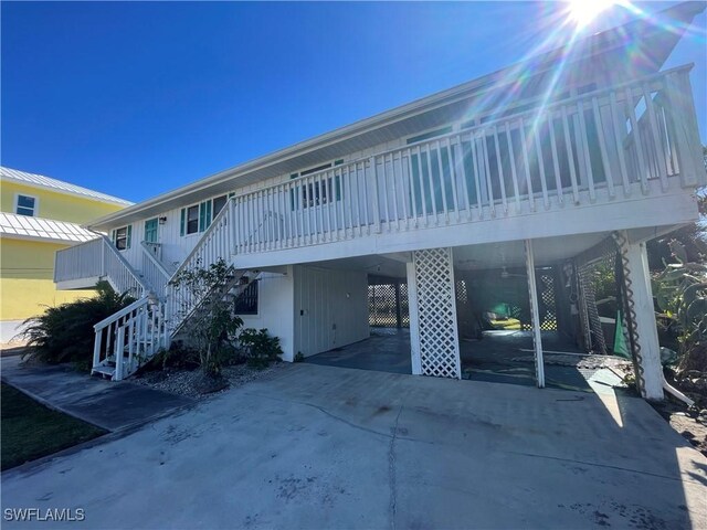 4861 Regal, Bonita Springs, FL 34134 - view of front facade featuring a carport