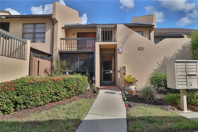 exterior space with stucco siding