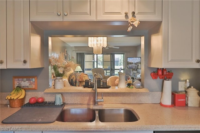 kitchen featuring white cabinetry