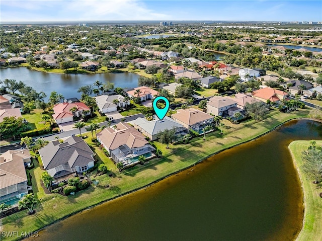 drone / aerial view with a water view