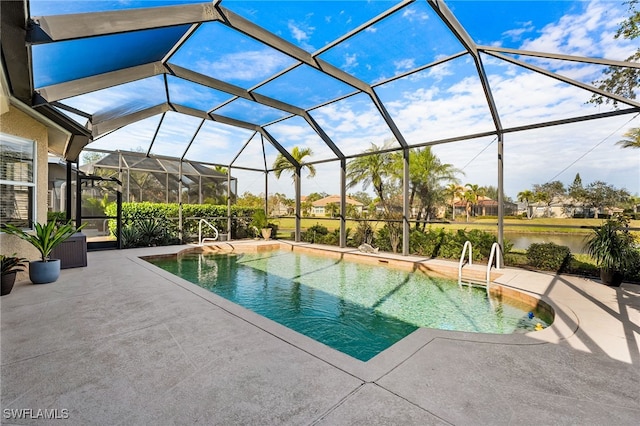 outdoor pool with glass enclosure and a patio