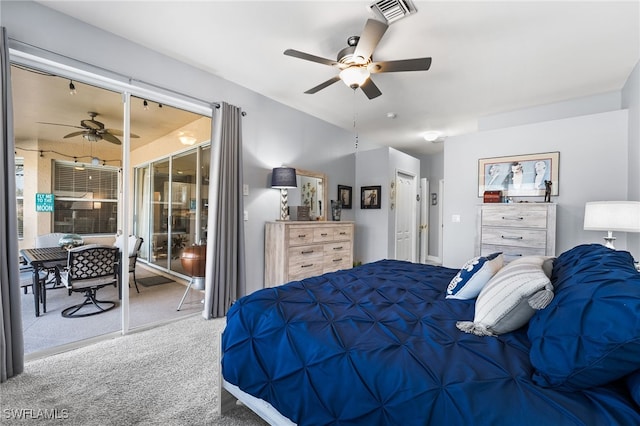 carpeted bedroom featuring a ceiling fan, access to outside, and visible vents