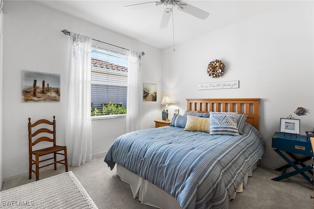 bedroom with carpet and a ceiling fan