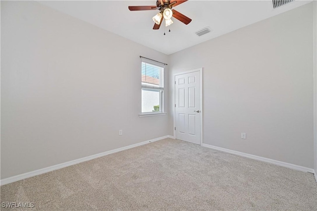 15133 Ligustrum Ln, Alva, FL 33920 - empty room with ceiling fan, light carpet, and baseboards