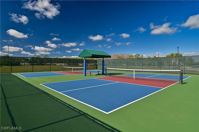 view of tennis court with basketball court