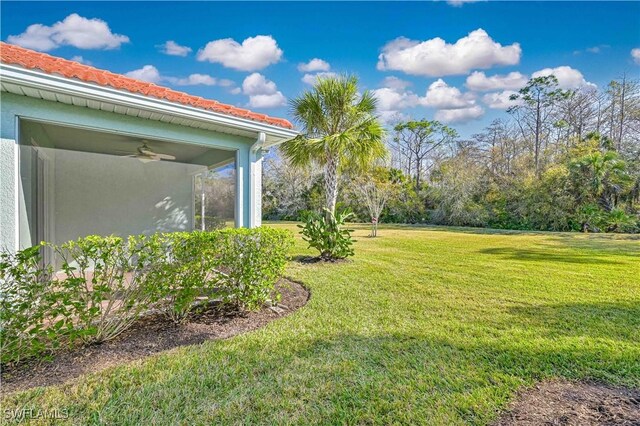 15133 Ligustrum Ln, Alva, FL 33920 - view of grassy yard with a ceiling fan