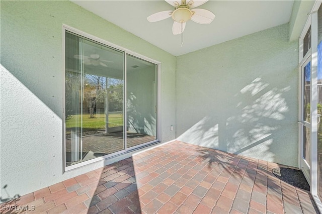 15133 Ligustrum Ln, Alva, FL 33920 - unfurnished sunroom featuring a ceiling fan