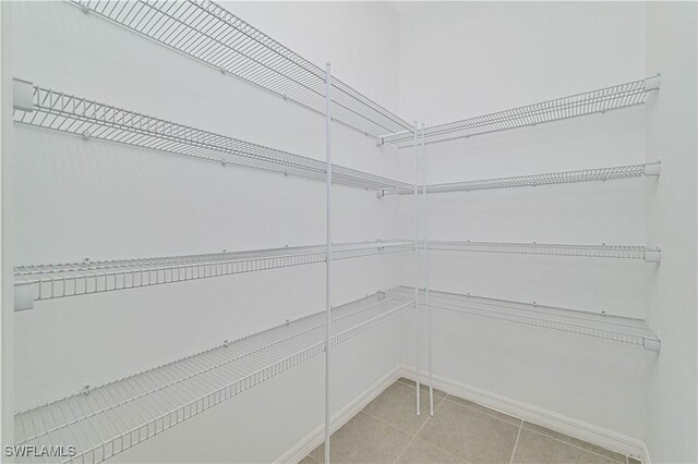 15133 Ligustrum Ln, Alva, FL 33920 - spacious closet featuring light tile patterned floors
