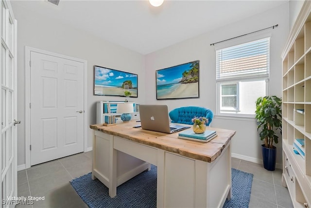 office with light tile patterned floors