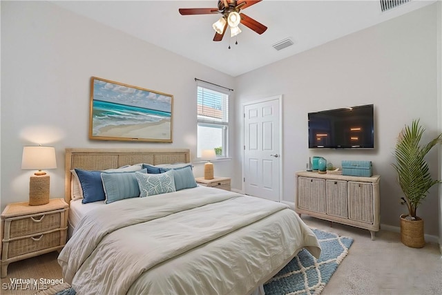 carpeted bedroom featuring ceiling fan