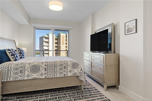 bedroom with light hardwood / wood-style flooring