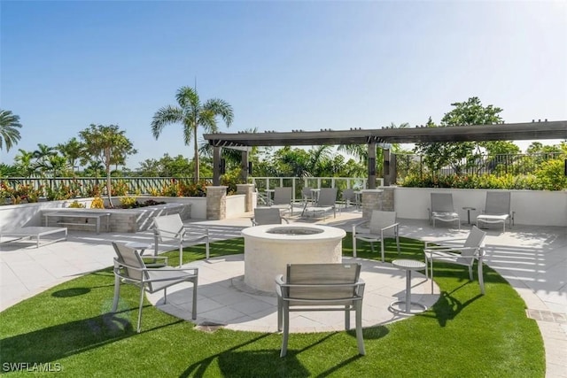 view of patio / terrace with an outdoor fire pit