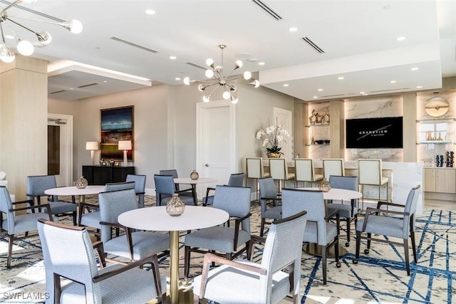 dining room featuring an inviting chandelier