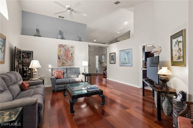 living room with high vaulted ceiling, ceiling fan, and dark hardwood / wood-style flooring