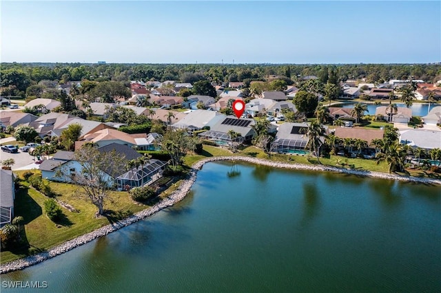 drone / aerial view with a water view