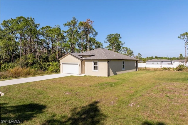 view of property exterior with a yard and a garage