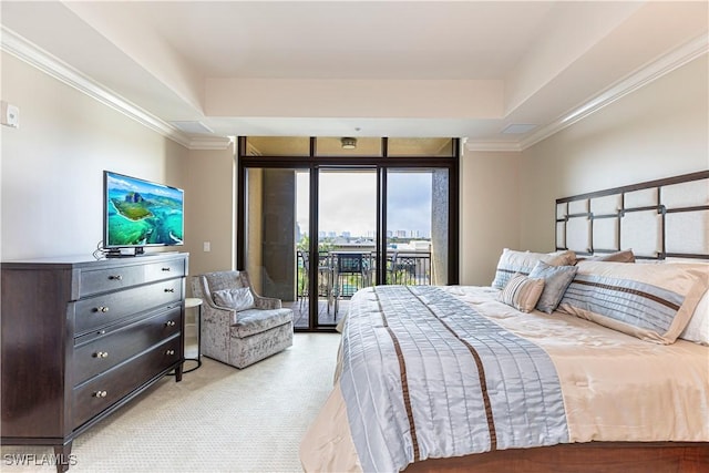 bedroom featuring access to exterior, a raised ceiling, light colored carpet, and crown molding