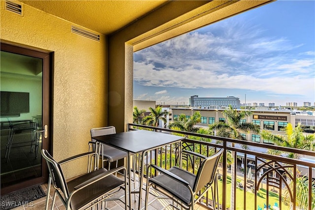 balcony featuring a view of city